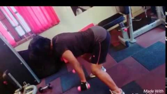 'Indian female fitness workout - reverse delt round'