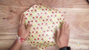 'Cover a bowl with BeeBee reusable beeswax food Wraps'