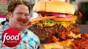 'Is This Burger Smothered In Ghost Pepper Sauce Too Hot To Handle? | Man V Food'