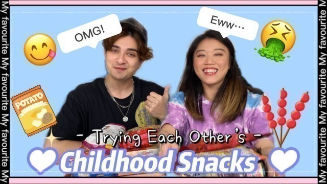 'Trying out each other Childhood Snacks'