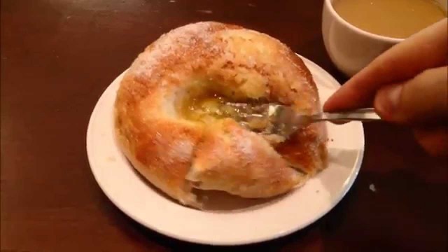 'The Food Emperor eating a voisilmäpulla at Café Esplanad in Helsinki, Finland.'