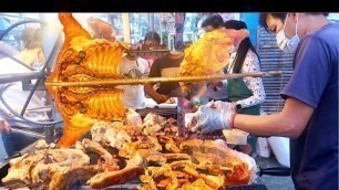 'Best selling grilled pork, street food in Phnom Penh at Toul Tompoung Market'