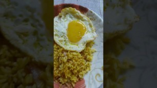 'Fried rice with sunny side up egg #youtubeshorts #viral #youtube #food #virel#youtubeshorts'