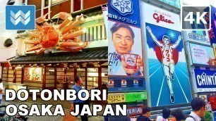 'Walking around Dotonbori Street in Osaka, Japan. Japanese Street Food Tour 