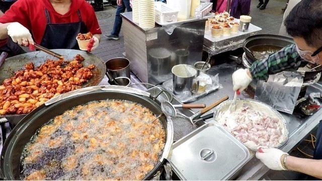 'Korea Street Food. \'Chimaek\' Deep Fried Chicken and \'Tteokbokki\' Rice Cake. Myeongdong, Seoul.'