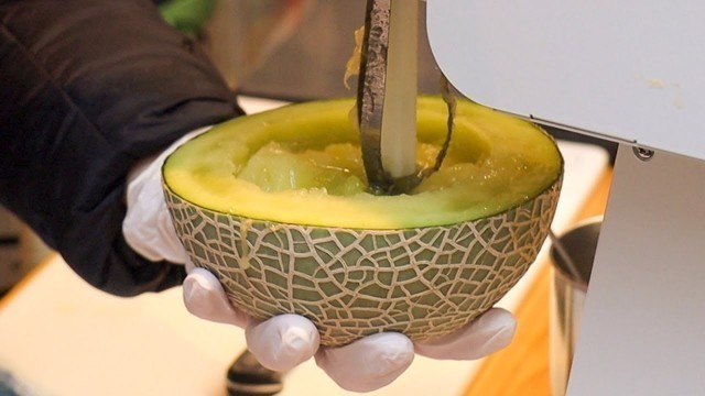 'Cantaloupe Melon Juice - Japanese Street Food -  Kuromon Osaka Japan'