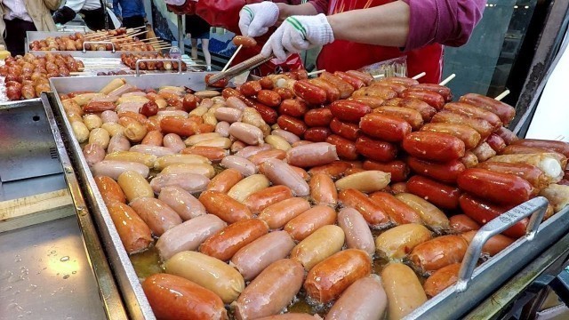 'Massive Dose of Sausages Skewers. Korea Street Food in Myeongdong, Seoul'