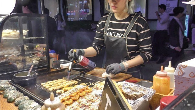 'Roasting Shrimps Skewers. Korea Street Food in Myeongdong, Seoul'