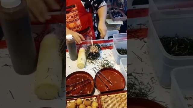 'Thai street food stall selling Takoyaki with lots of seaweed #Shorts'