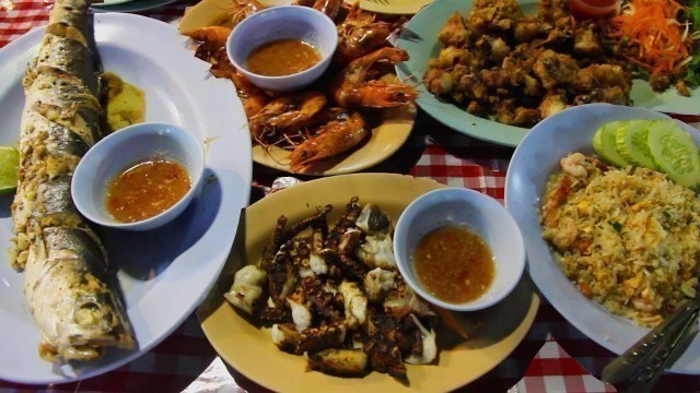 'Thai Street Food: A Seafood Feast at a Night Market in Thailand'