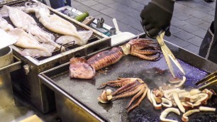 'Huge Grilled Squid. Korea Street Food in Myeongdong, Seoul'