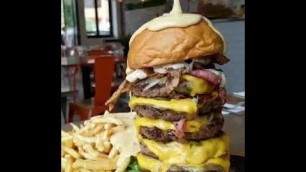 'Owner foodcoma eats # cheesy # cheesepour # videos # foodvideos # burgervideo # cheesyfries'