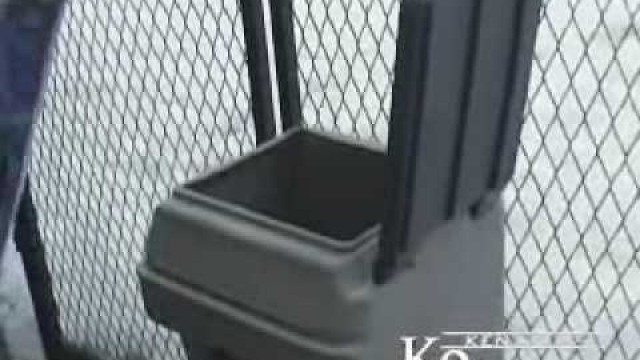 'K9 Kennels Food Dispenser, k9kennelstore.com 1-877-527-3455'