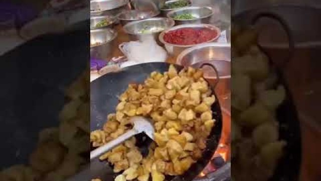 'Famous Chinese street food - Amazing skills of chef making yummy stir fry chicken with potato cubes'