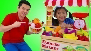 'Wendy Pretend Play with Farmers Market Food Stand Toy Selling Fruits & Veggies'