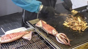 'Top Korea Street Food, Seoul. Huge Grilled Squids and Roast Lobsters with Melted Cheese. Myeongdong'