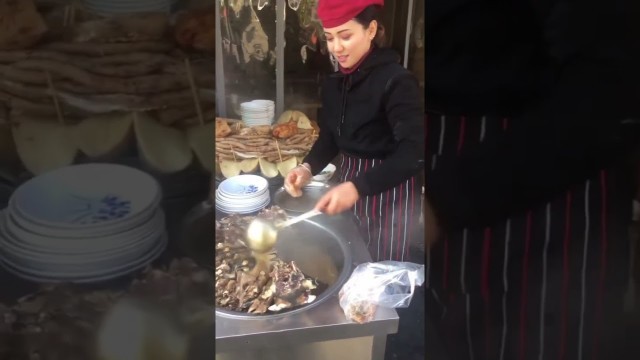 'Famous Chinese street food - Uyghur beauty making yummy lamb stew 新疆炖羊排 #Shorts'