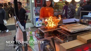 'Myeongdong Street Food Baked Lobster and Flaming Eel Seoul, South Korea'