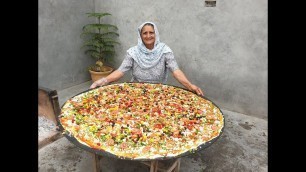 'PIZZA | GIANT PIZZA ON BIG TAWA | VEG PIZZA RECIPE PREPARED BY MY GRANDMA | VEG VILLAGE FOOD'