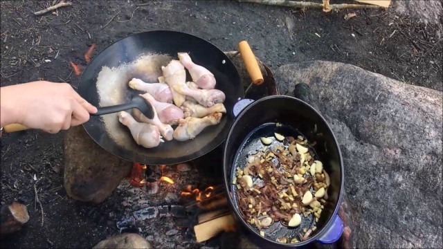 'Outdoor cooking making chinese and Manipuri food.'