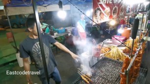 'Grill chicken wings Malaysian street food in Tawau'