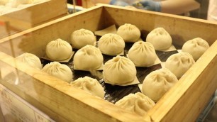 'Japanese Street Food - Pork Bun Nikuman  Osaka Japan'