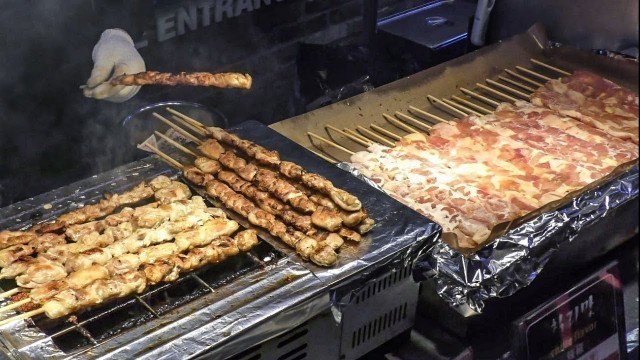 'Huge Dose of Chicken Skewers. Korea Street Food in Myeongdong, Seoul'