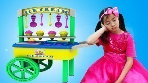 'Emma and Jannie Pretend Play with Ice Cream Cart Food Toys'