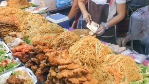 'Thai Street Food in Phuket. Meat, Fish, Pad Thai and more at Banzaan Night Market. Patong, Thailand'