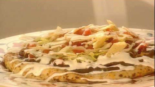 'pizza recipe by sanjeev kapoor video'