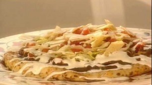 'pizza recipe by sanjeev kapoor video'