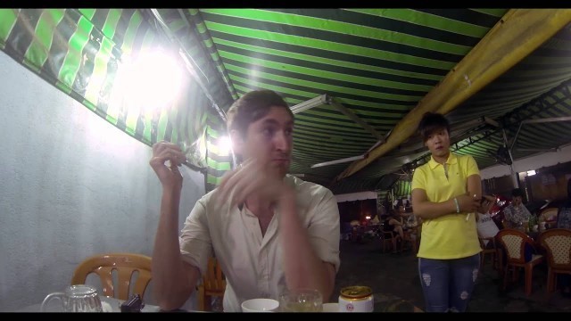 'Wanna eat a live larvae coconut worm? Extreme street-food in Vietnam with Back of the Bike Tours'