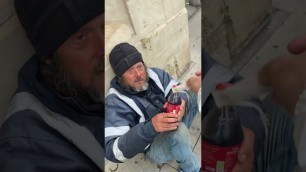 'Giving Homeless People Money and food'