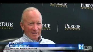 'Purdue president receives first food robot delivery as university launches service on campus'