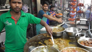 'Indian People Enjoying Famous Lucknowi Biryani & Chicken Kebab - Street Food Lucknow India'